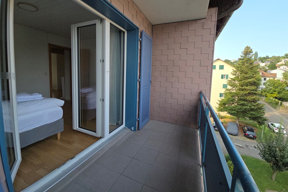 Bedroom 1 with private balcony
