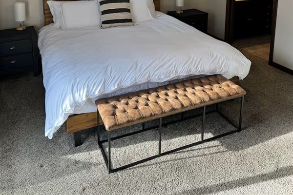 Luxury king master suite with private bath - your peaceful retreat after a full day.