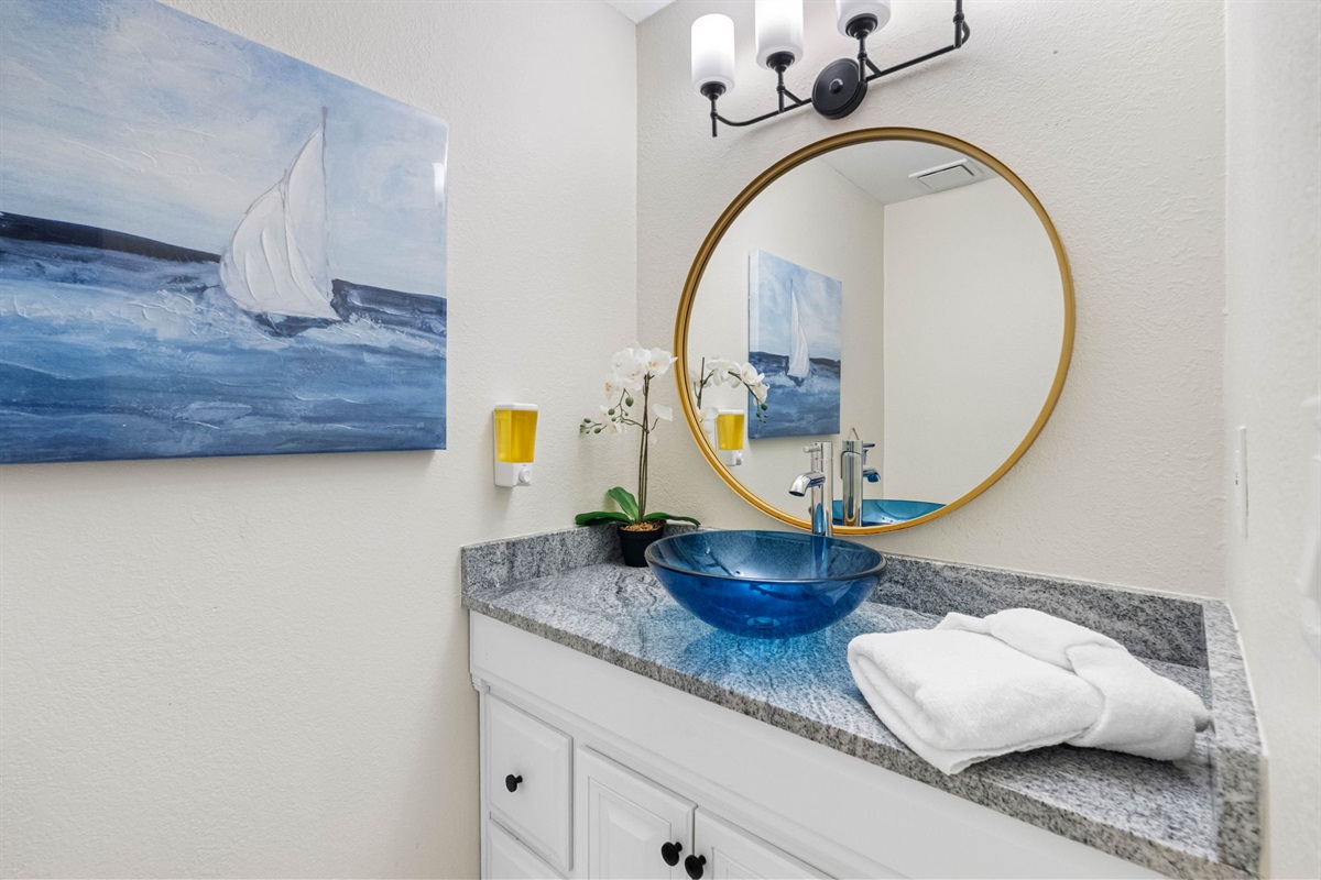Experience luxury in the ensuite bathroom featuring a modern walk-in shower and exquisite interior design.