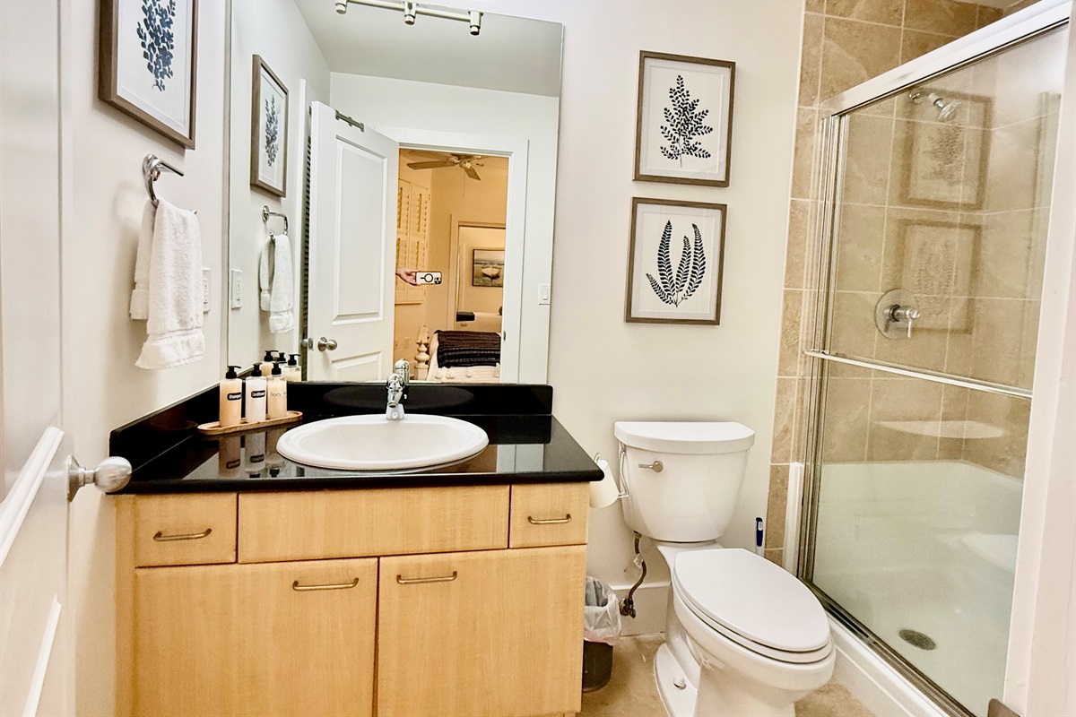 Bathroom #2 has a linen closet and a spacious vanity.
