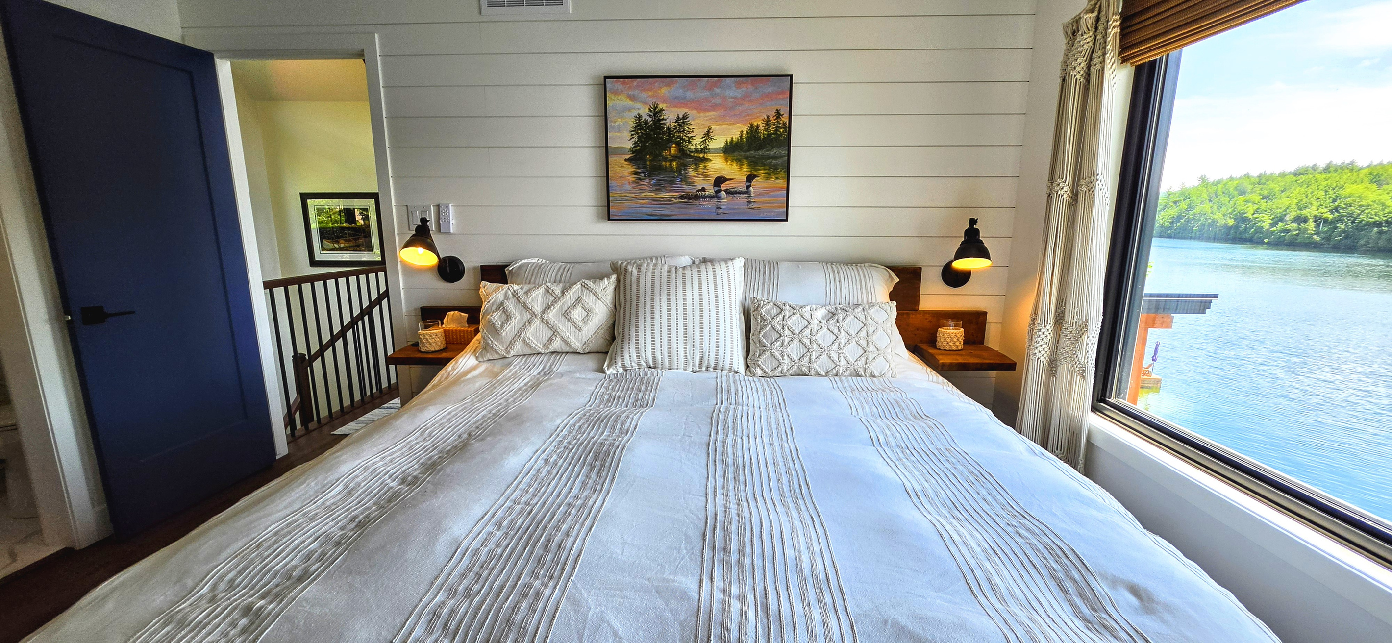 Master bedroom with dramatic view of Lac McGregor