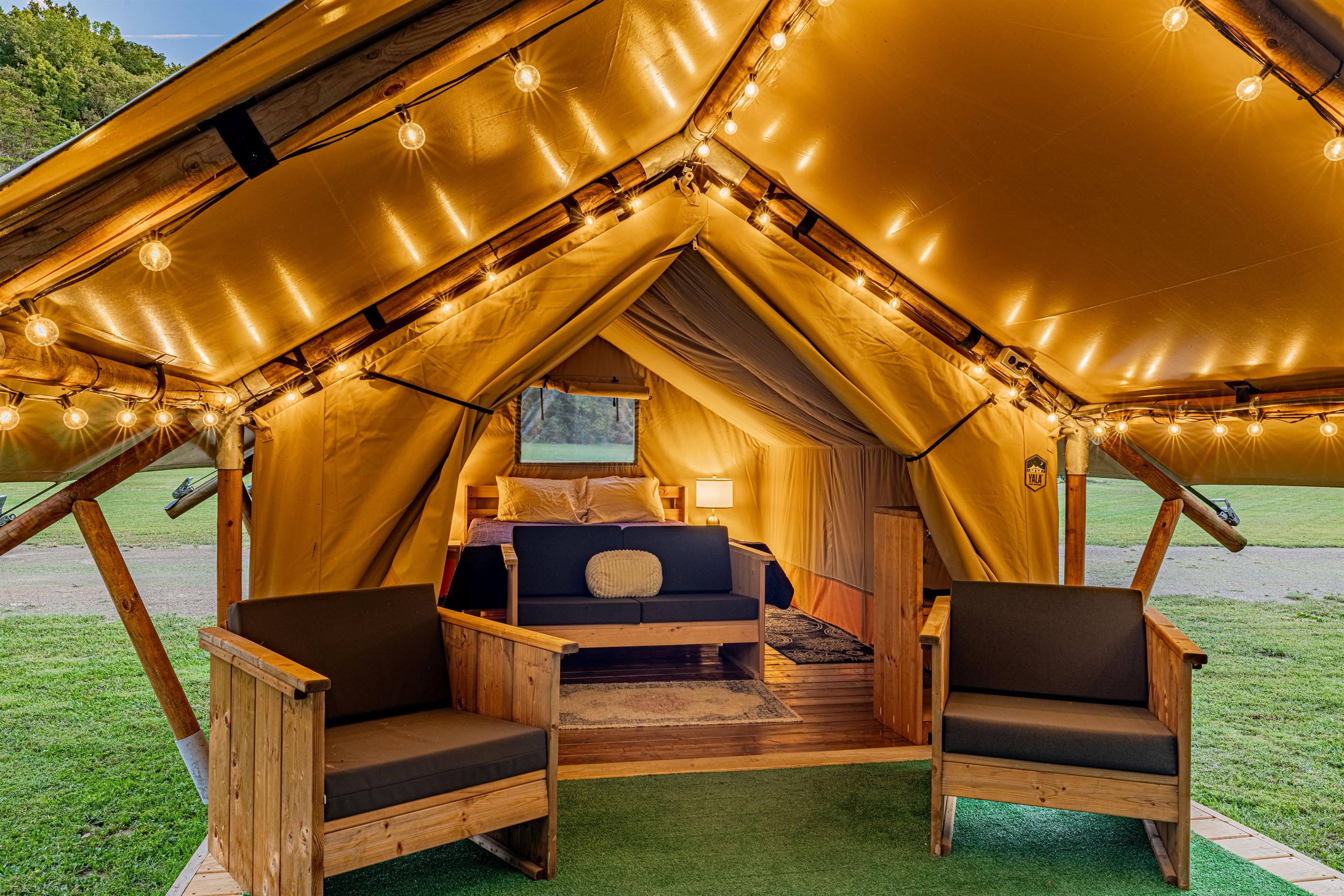 Glamping vibes are strong here! We bring the party lighting to the woods, creating a magical space that feels both rustic and refined.