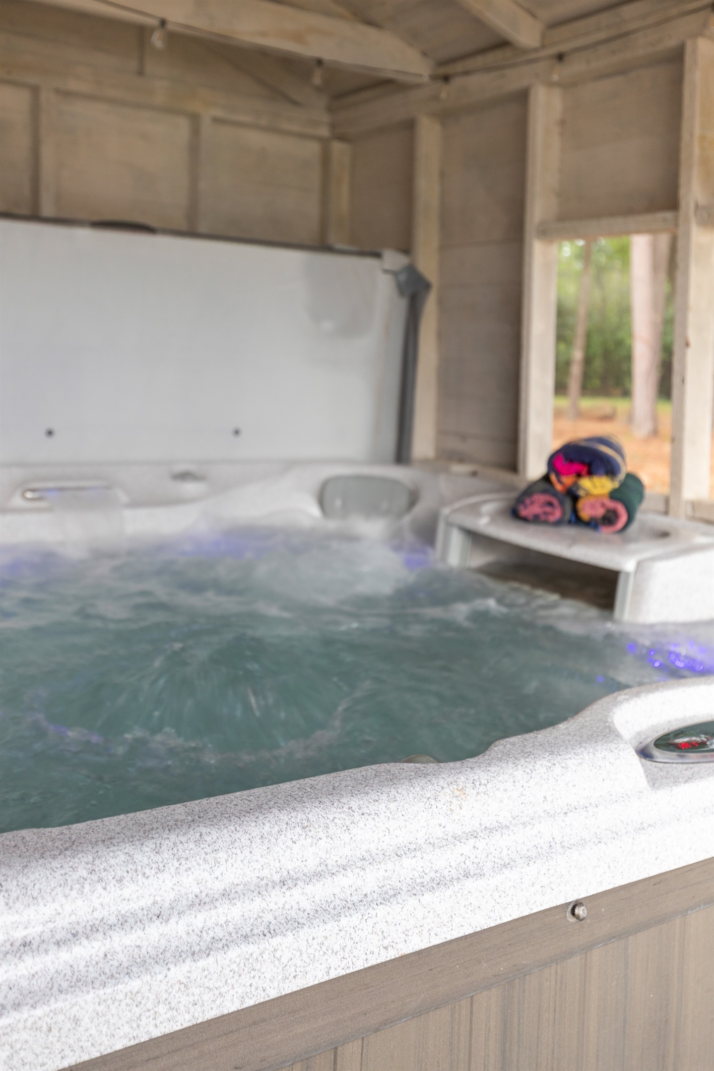 Unwind in the hot tub—the perfect spot to relax after a day on the lake.