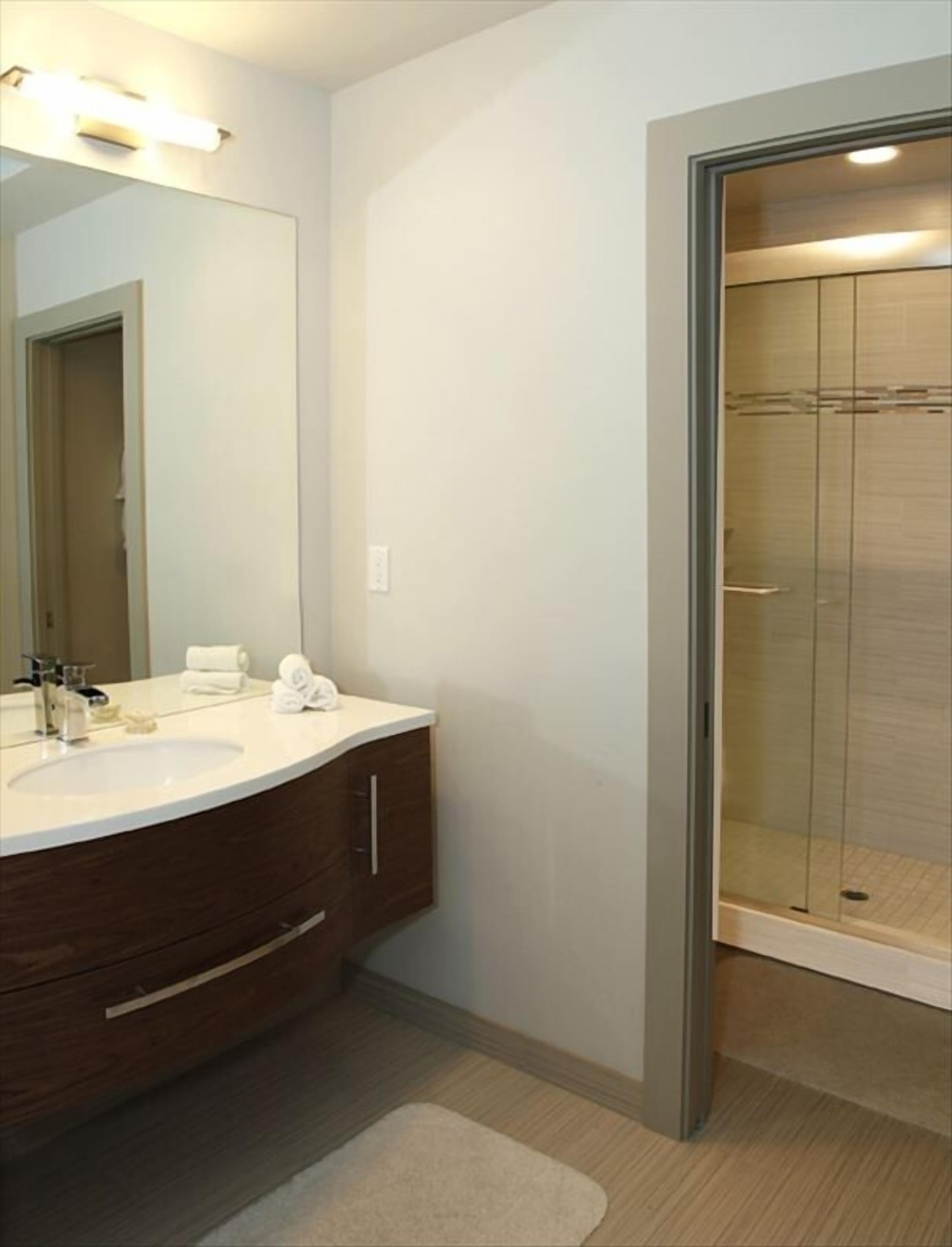 Master bathroom has large shower with two separate shower heads