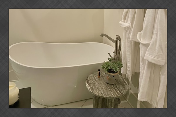 Welcome to your own private spa complete with deep soaking tub and bath robes!