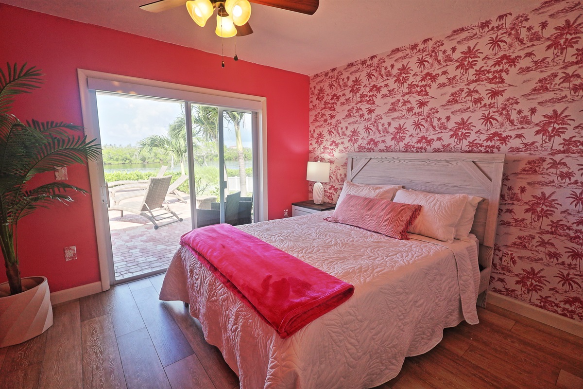We call this the sunset room.  It is in a suite of rooms with King room #3 and a full bath.  But it is the only bedroom with a direct slider to the pool deck.