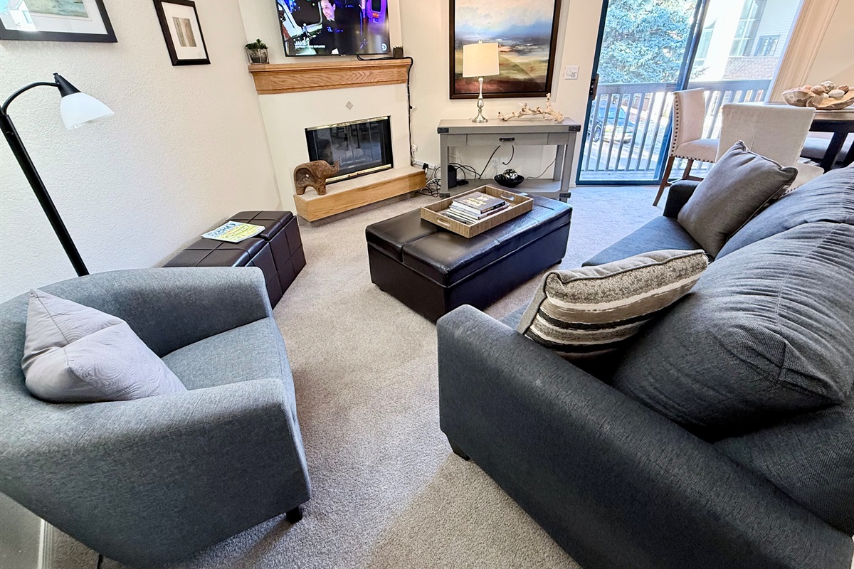 Living room with gas fireplace and comfortable seating