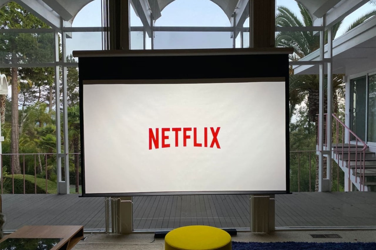 "Hidden" 4k projector and 120" projector screen. Built-in sound sound theater system.
