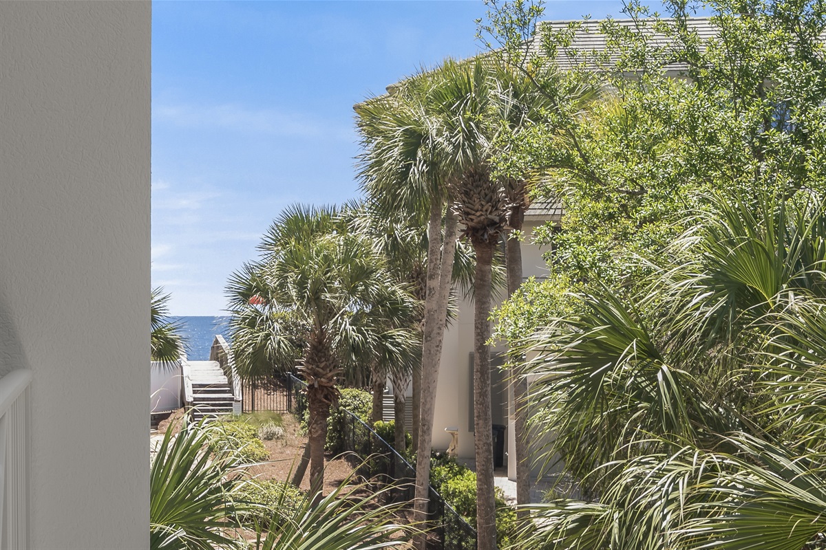 Sip your morning coffee or unwind at sunset with beautiful peek-a-boo views of the Gulf.