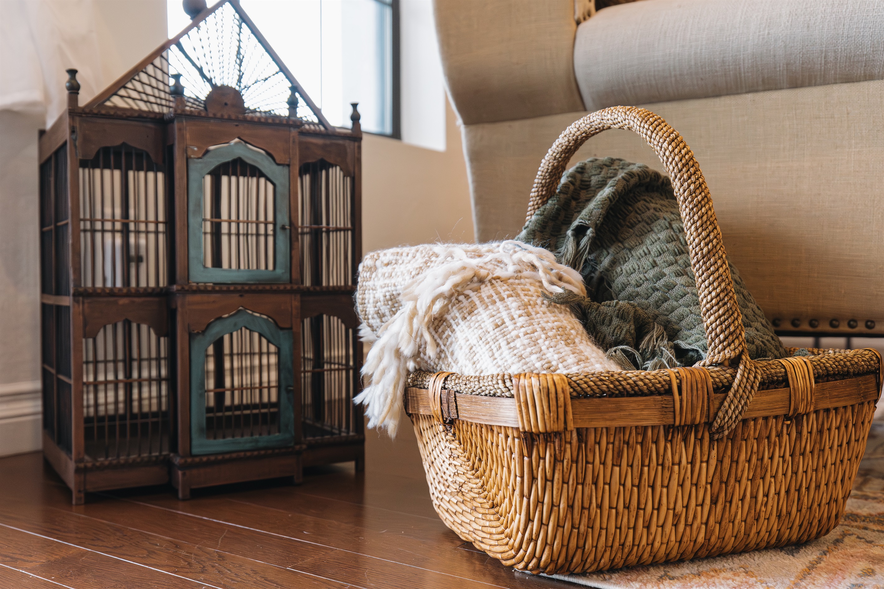 Cozy living space details with soft blankets and warm textures—perfect for relaxing after a day of mountain adventures. Attiwood Ridge offers a comfortable Pinetop retreat for couples and families.