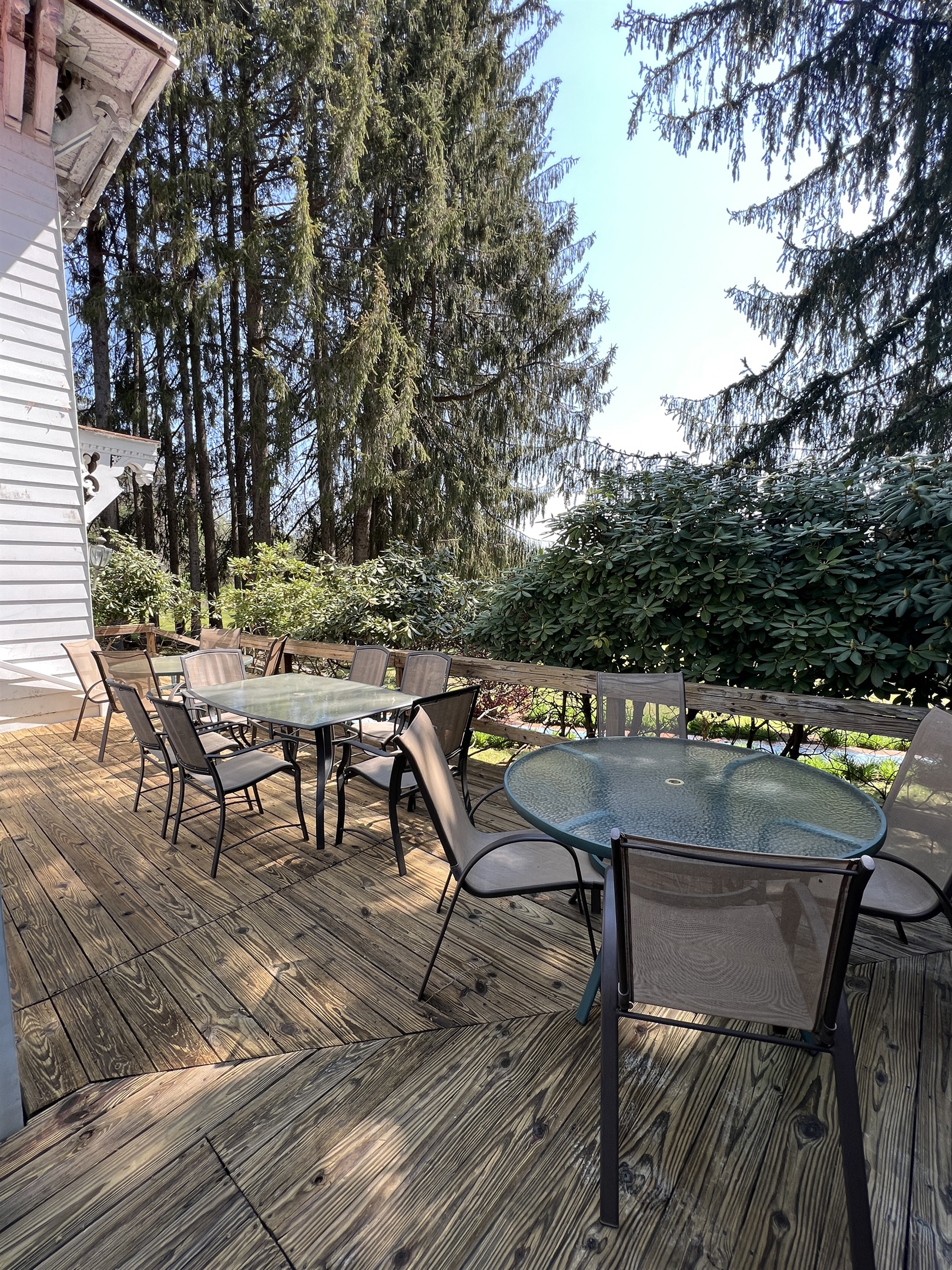 Large deck overlooking the large private lawn.