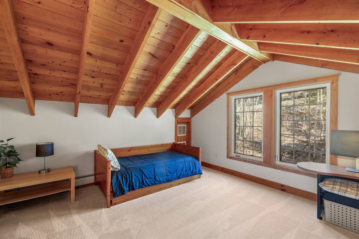 Loft space with two twin beds (trundle), dedicated workspace with extra monitor, and Amazon Fire Stick with Hulu Live TV, ESPN+, and Disney+