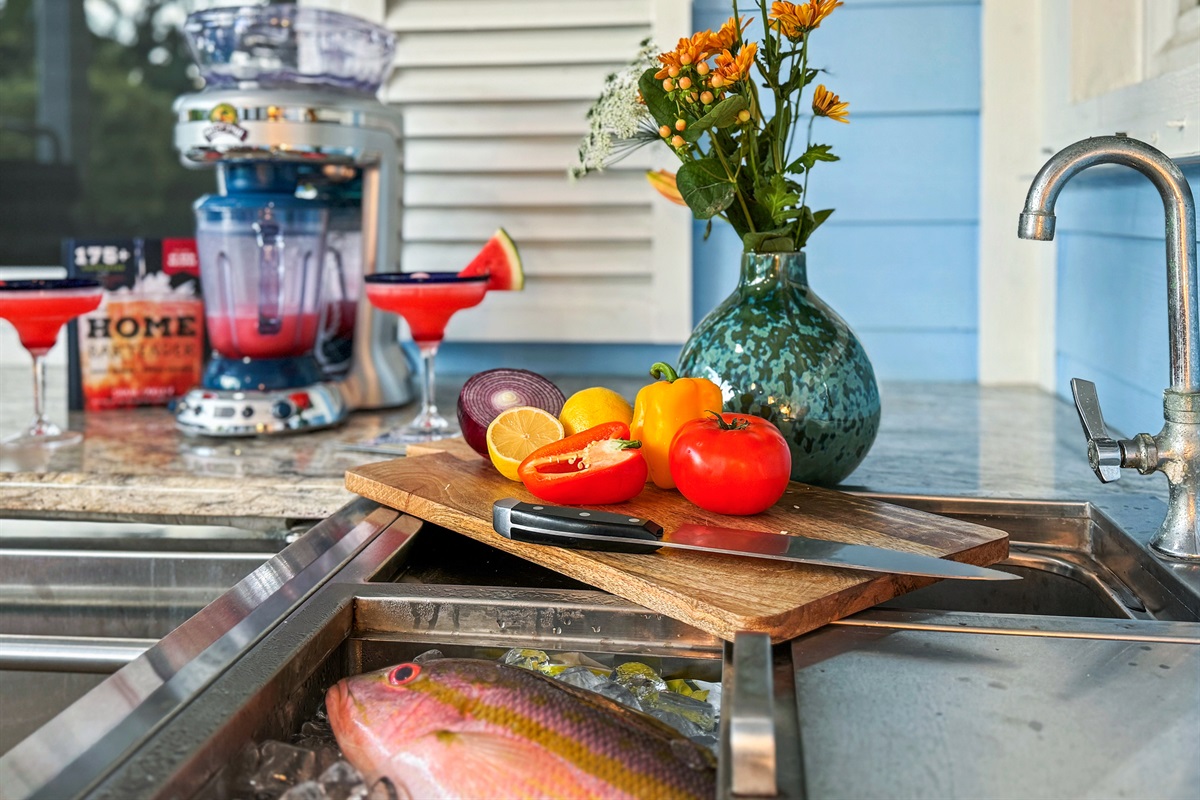 There's even an outdoor sink for proper meal prep.