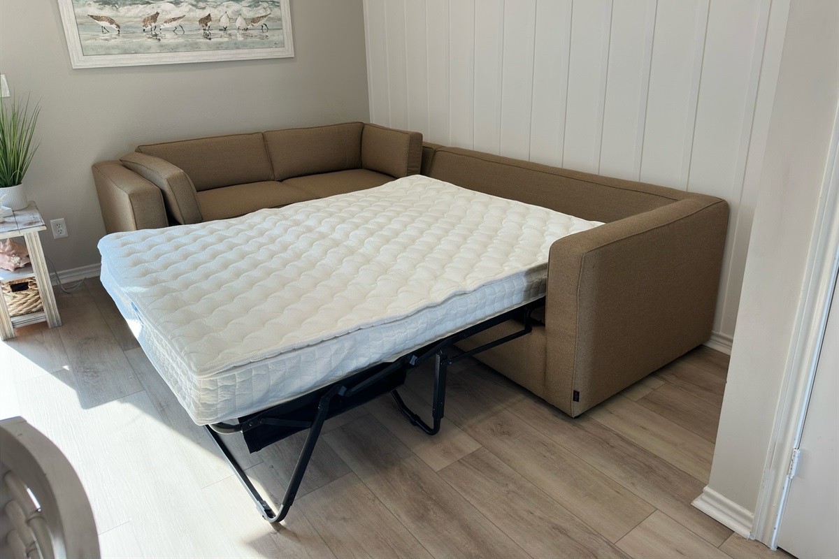 Unfolds into a cozy queen bed