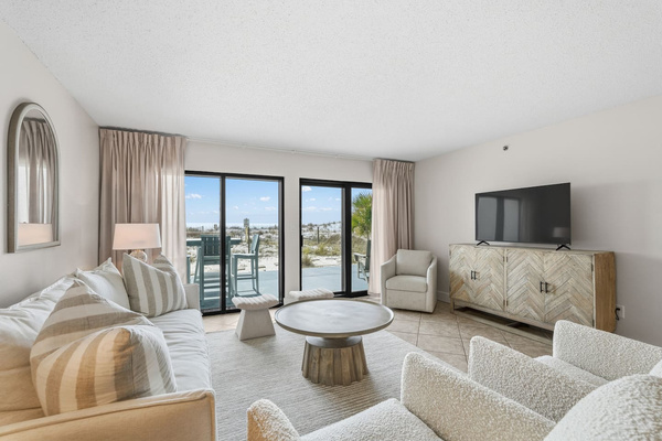 The living room comes with smart TV with games and books in the console media table