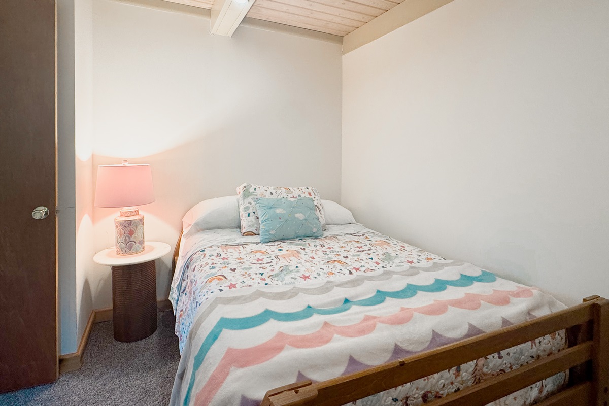 Main floor bedroom with standard full sized mattress