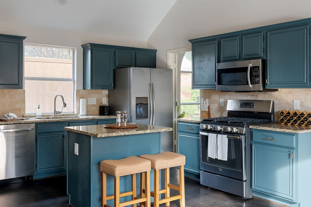 Unlock your culinary potential with this fully equipped kitchen, complete with all the cooking and baking essentials to turn your culinary dreams into delicious realities.