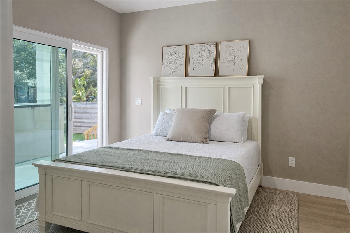 Queen master located at rear of home