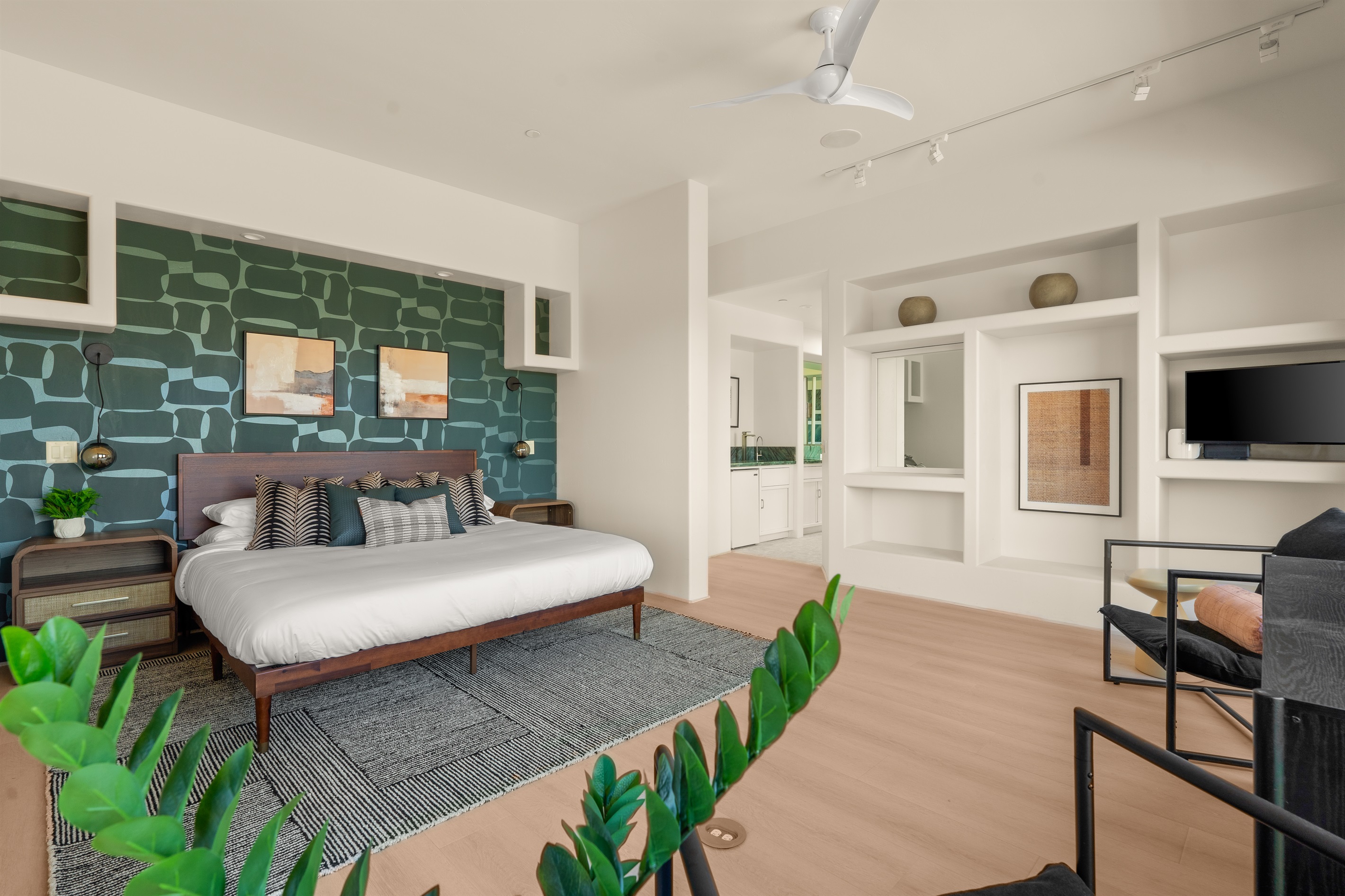 Step into your primary sanctuary. This massive, meticulously designed suite features a plush king bed, a private lounge area, and seamless access to the luxury en-suite.
