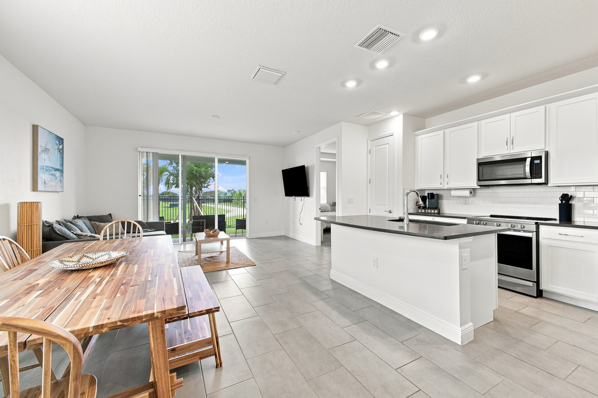 Open Kitchen to Dining Table and Entertainment Area