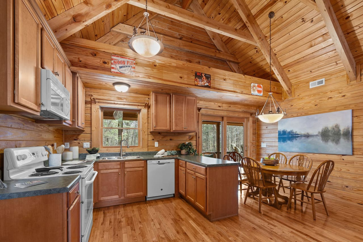 Fully stocked kitchen - open - dining room 