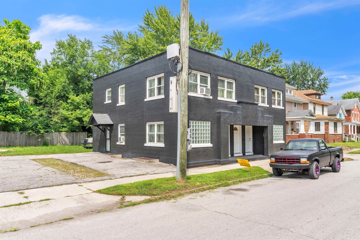 Spacious multi-unit building with private entrances and convenient off-street parking in a quiet neighborhood setting.