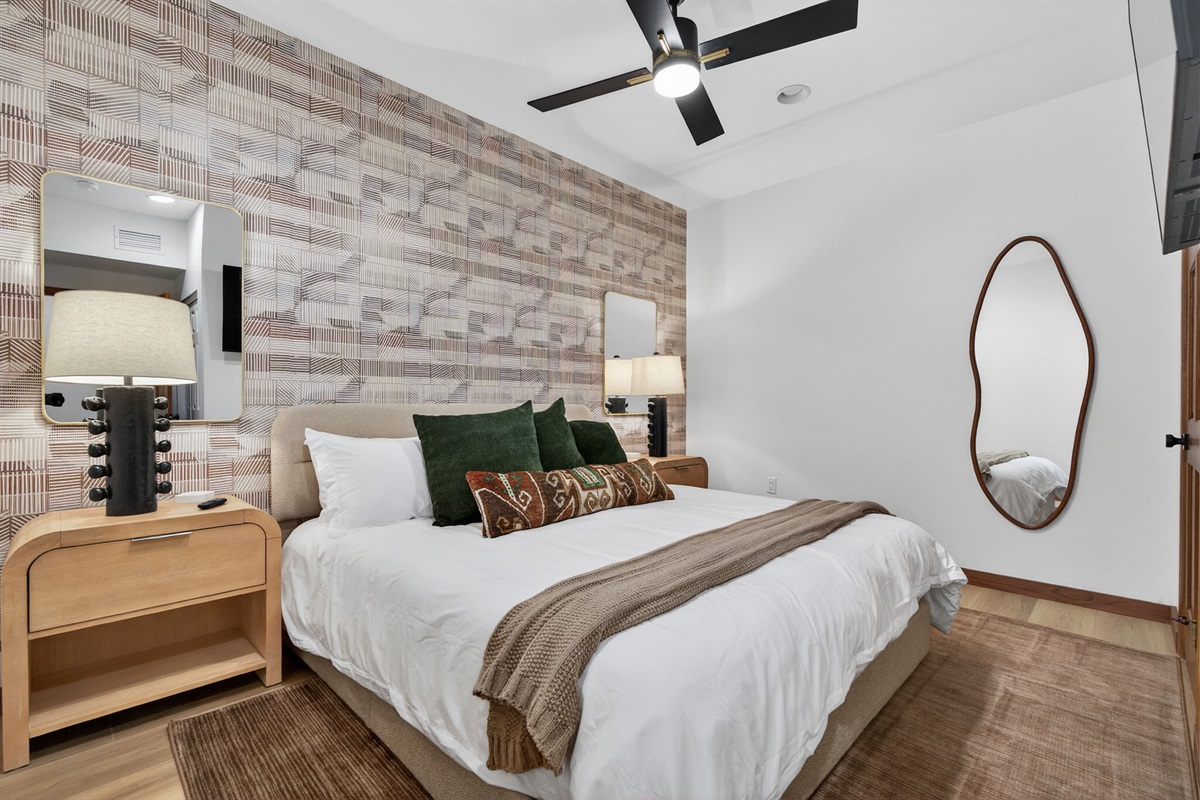 King bedroom 7- Warm, inviting, and beautifully finished. (Downstairs)