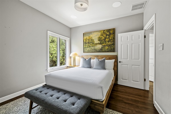 Bedroom 5 - Queen bed, full length closet storage.