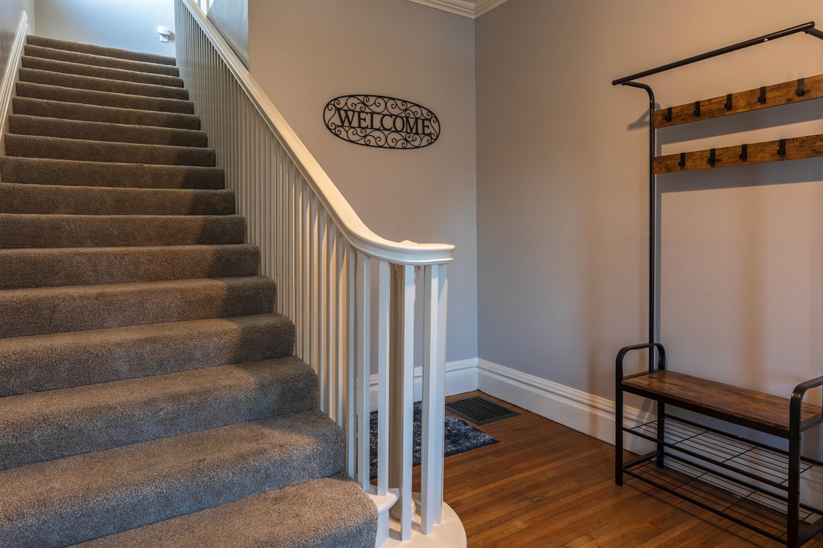 Once entering the front door, there is a large entry way before walking up the stairs to the entire living area.