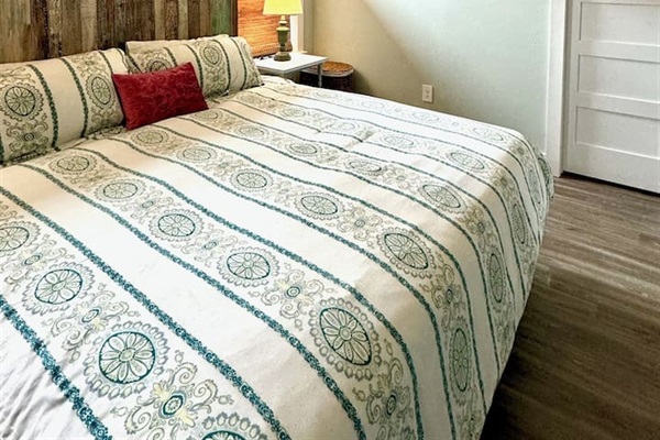 Second King Bed with large walk-in closet,  access to shared bath, linens