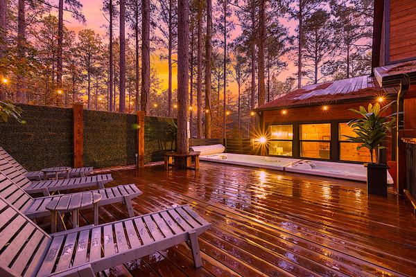 Expansive pool deck with plenty of seating to lounge, relax, and enjoy the swim spa