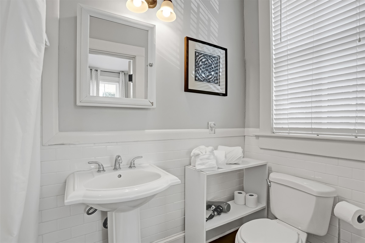 Refresh and unwind in a bright, minimalist bathroom.
