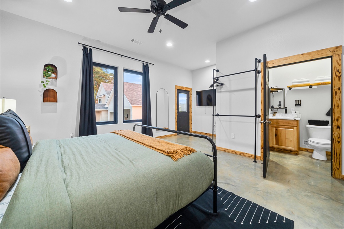 With stylish d&eacute;cor and plenty of room to move around, this bedroom blends character and comfort effortlessly.