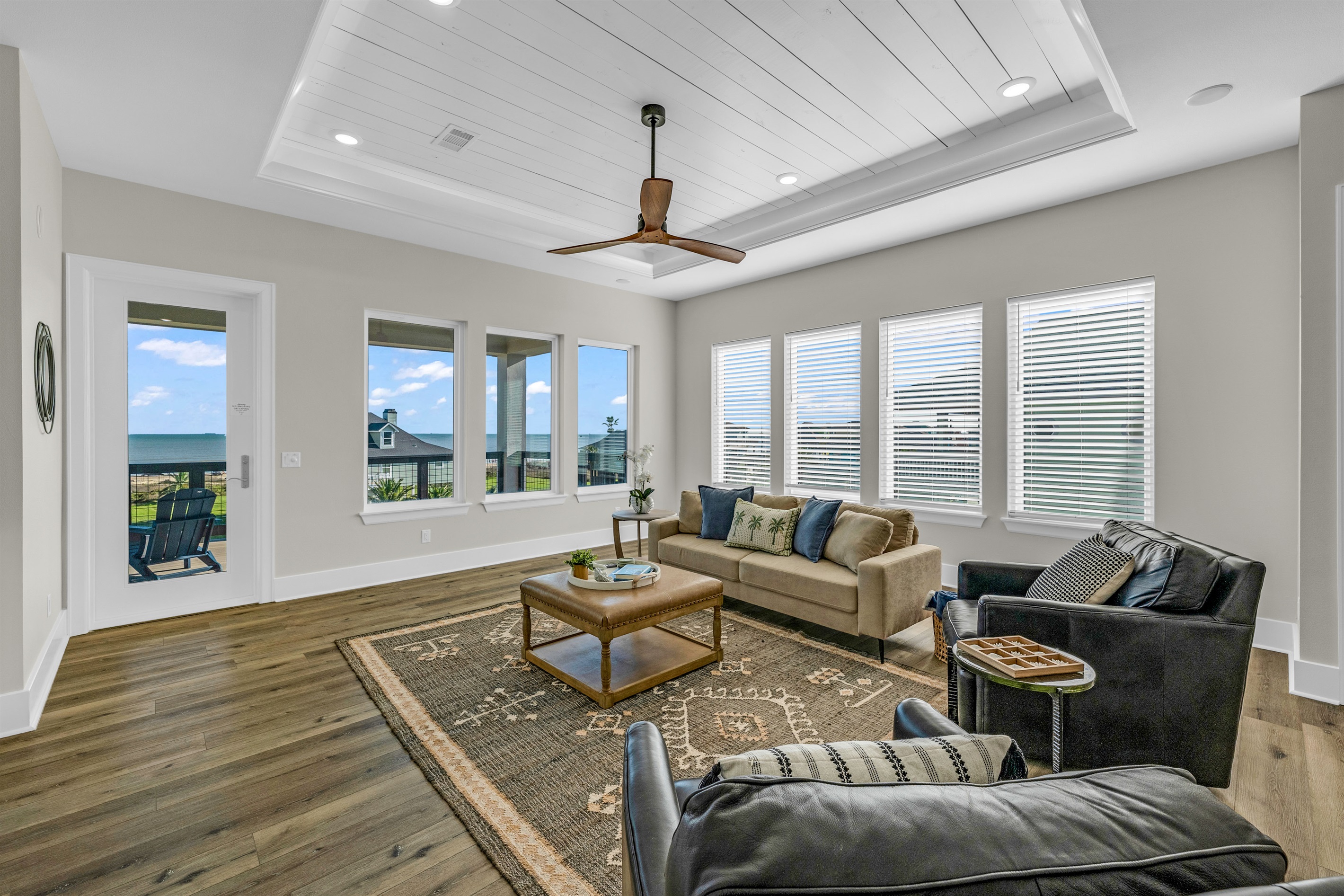 Costa Cristal Media Room: Enjoy spacious cinematic comfort in this media room with panoramic ocean views and abundant natural light.