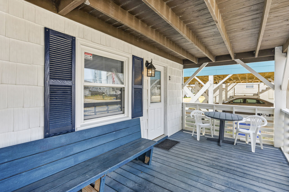 This is Unit 2 of a duplex.  Take in the oceanview from your front porch as you enjoy coffee in the morning or drinks have a day at the beach