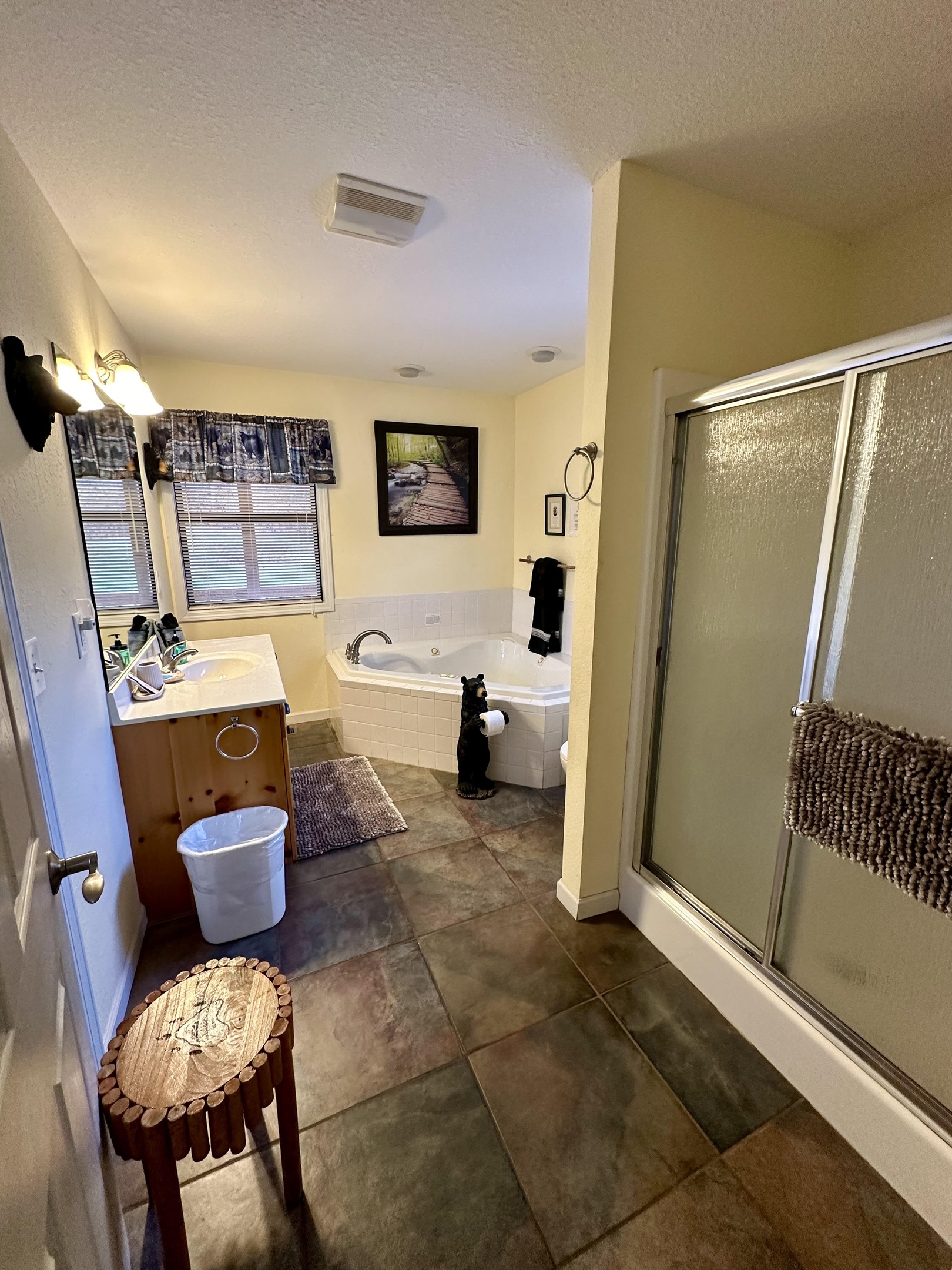 Modern bathroom with towels, starter soap & essentials provided