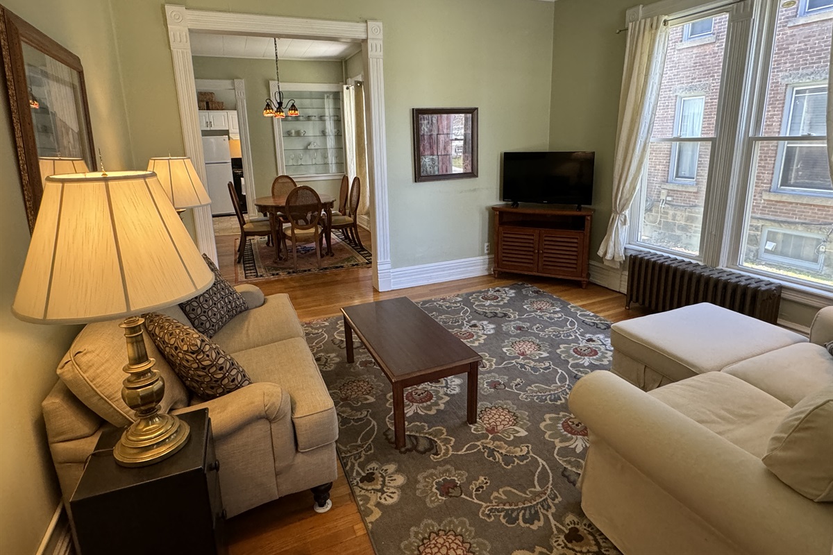 Spacious living room with large windows