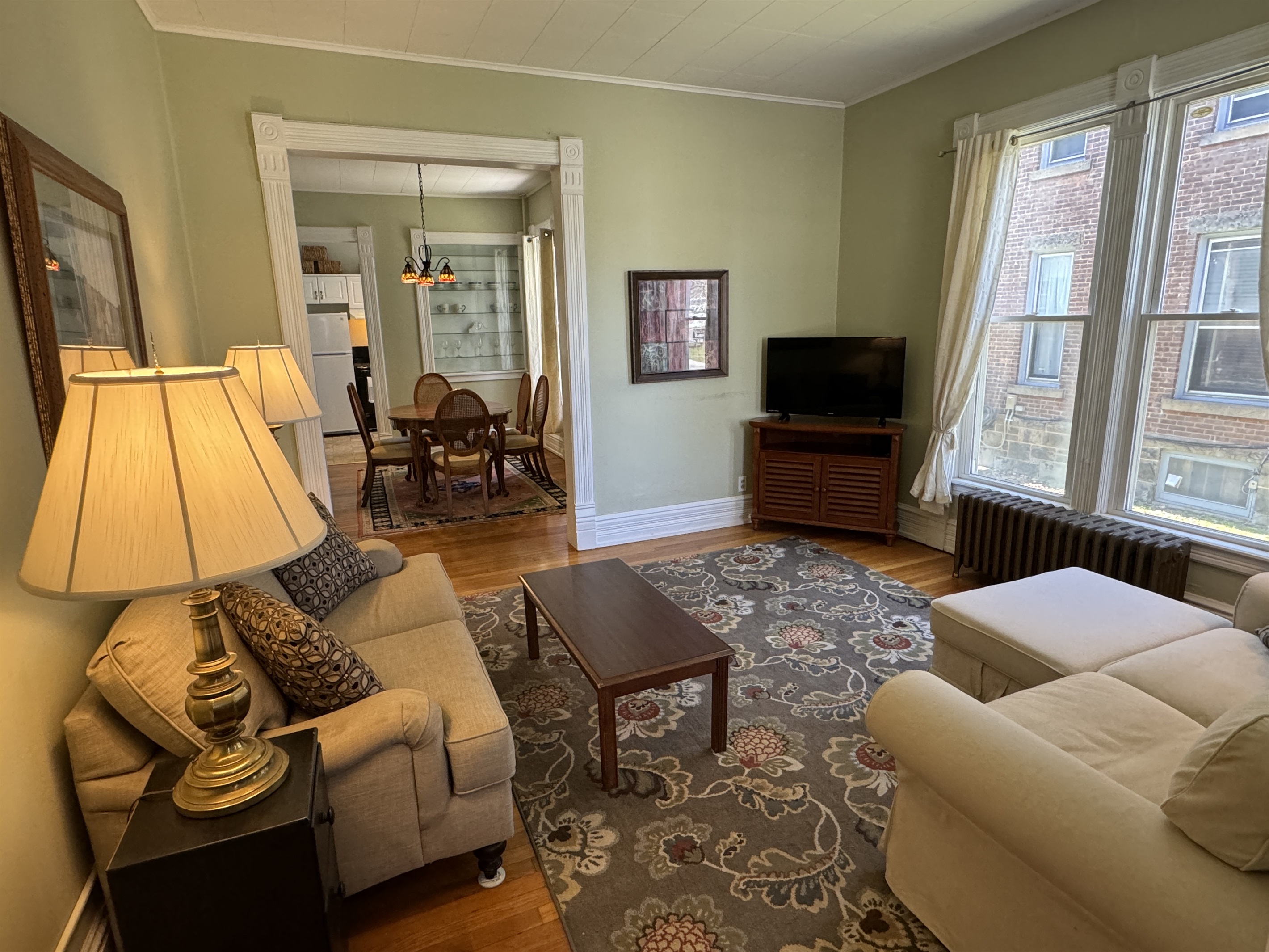 Spacious living room with large windows