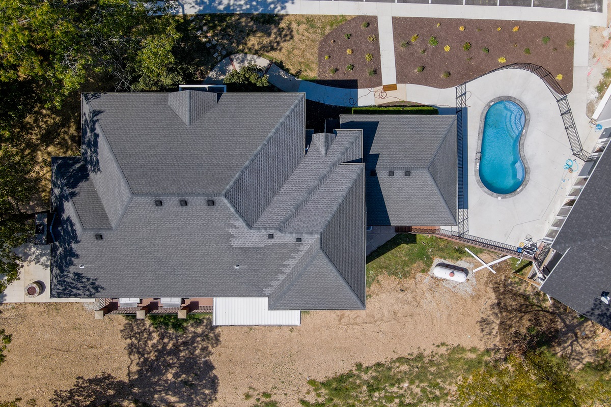 Aerial view of the manor with pool