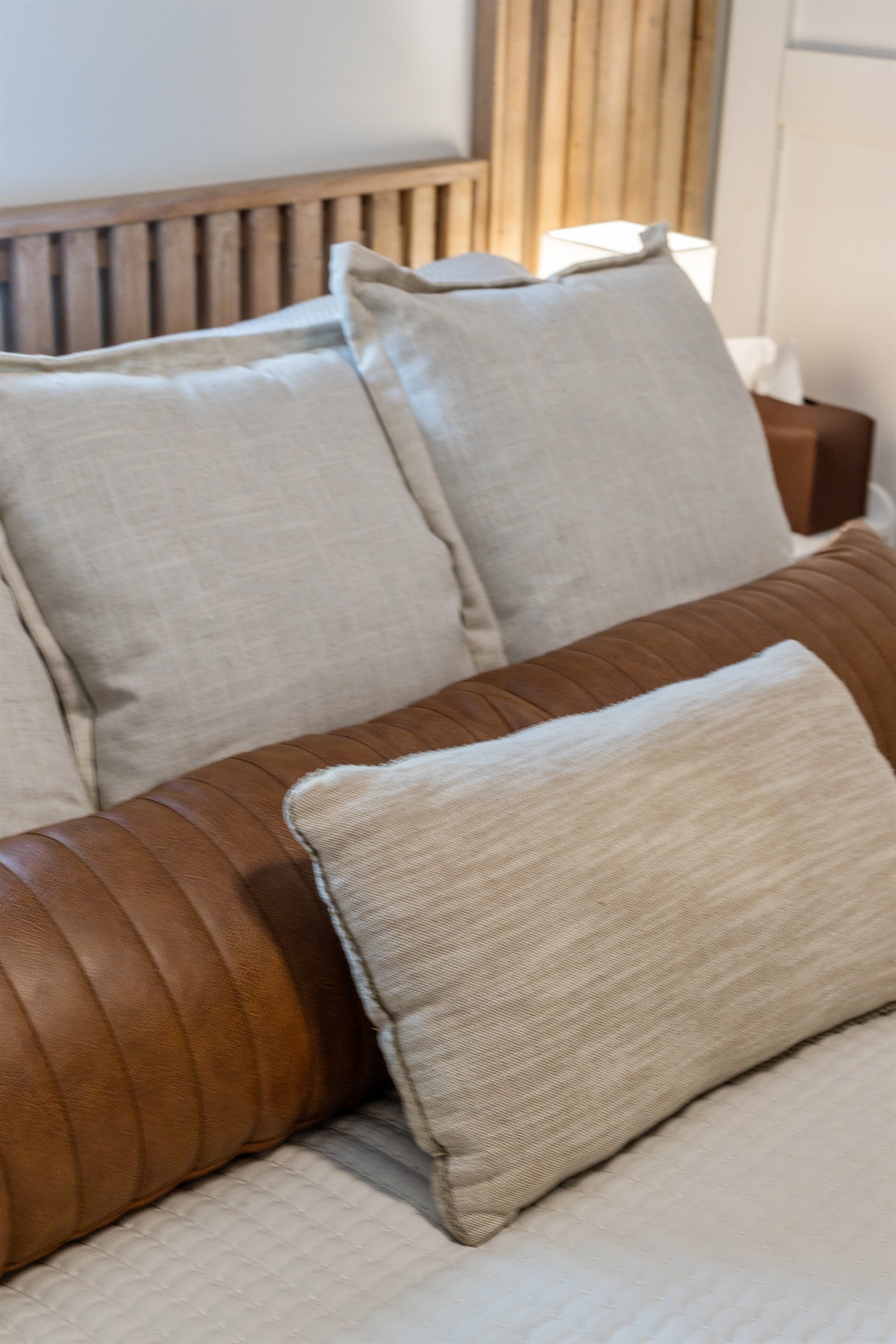 Soft pillows and cozy bedding create the perfect place to relax and recharge.
