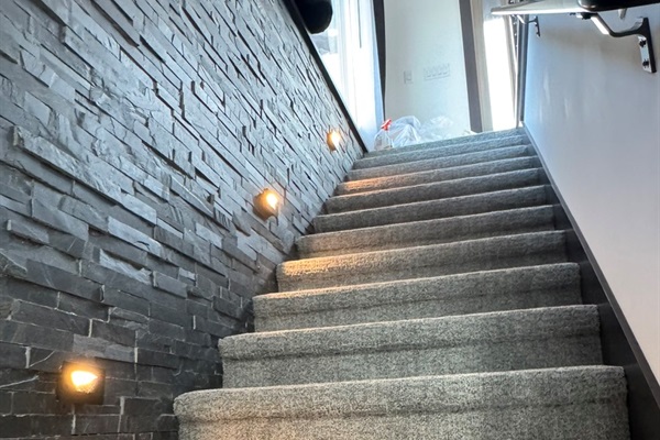 Lighted stairway to the lower level