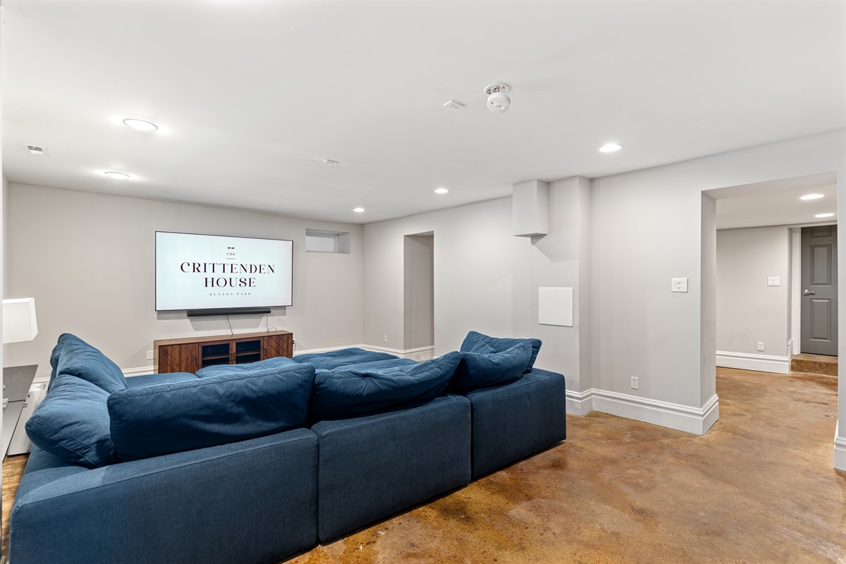 Stretch out, relax, and enjoy movie night in the basement on the oversized sectional.