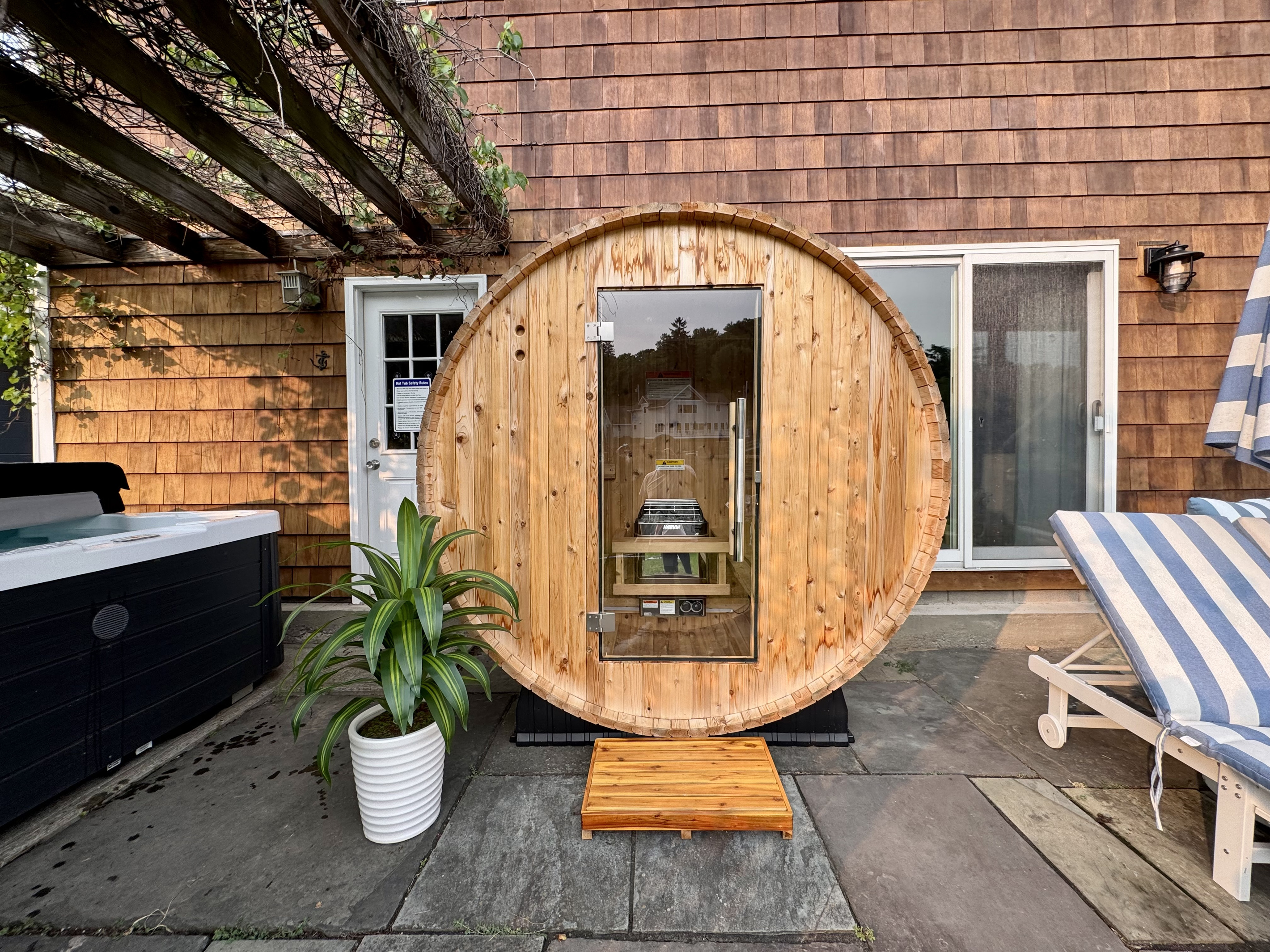 Recharge in your private cedar barrel sauna after a day on the water.