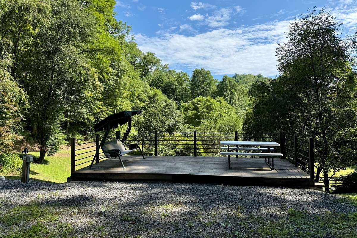 Morning coffee, swinging bench, and a view of the pasture. Welcome to Site 1.