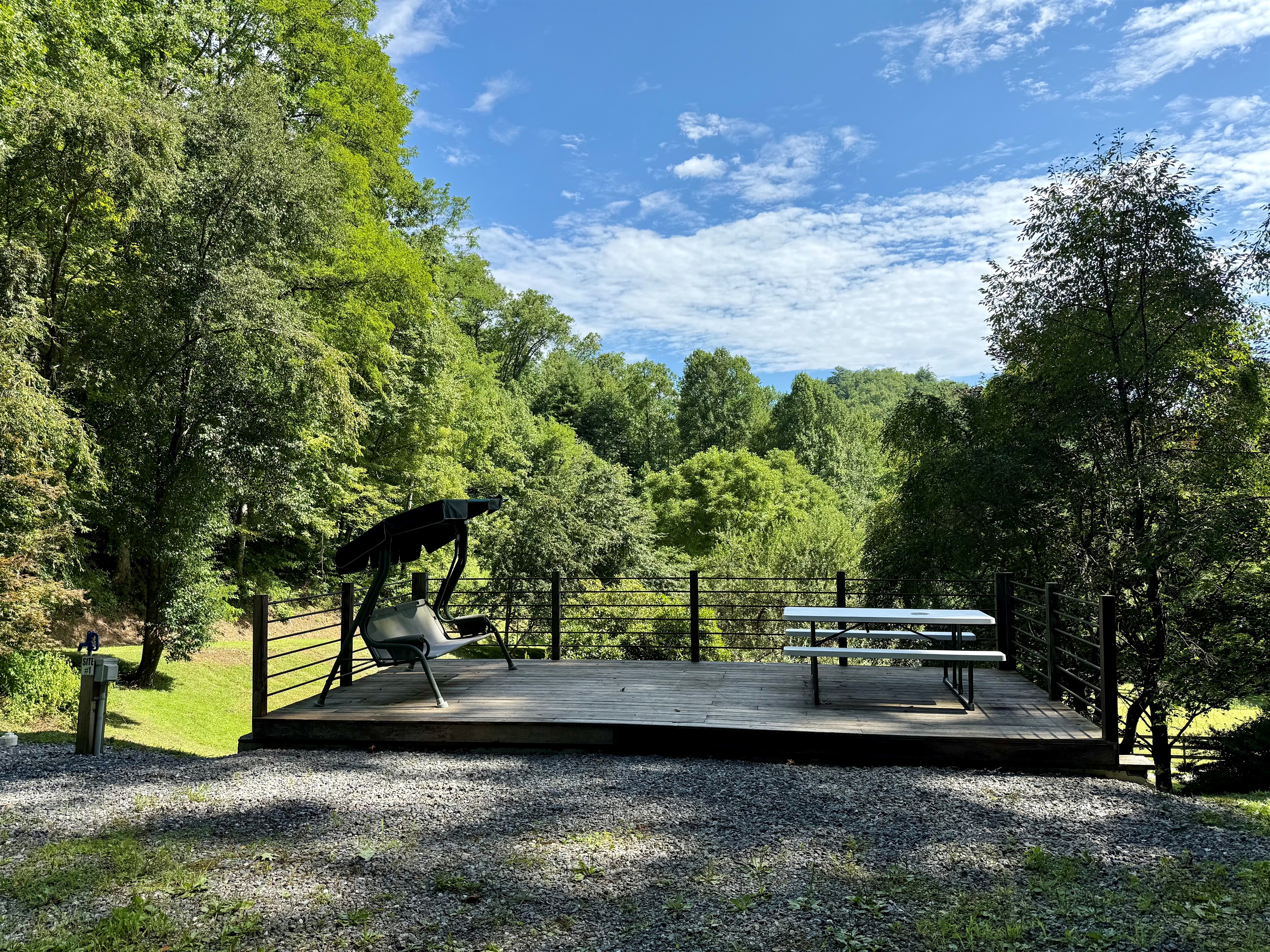 Morning coffee, swinging bench, and a view of the pasture. Welcome to Site 1.