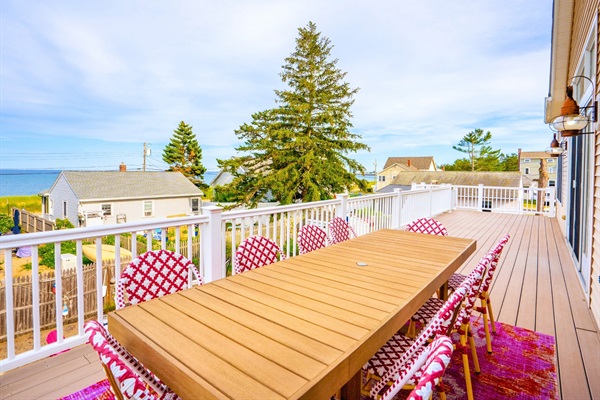 The deck’s seating invites you to relax, recharge, and enjoy the outdoors.