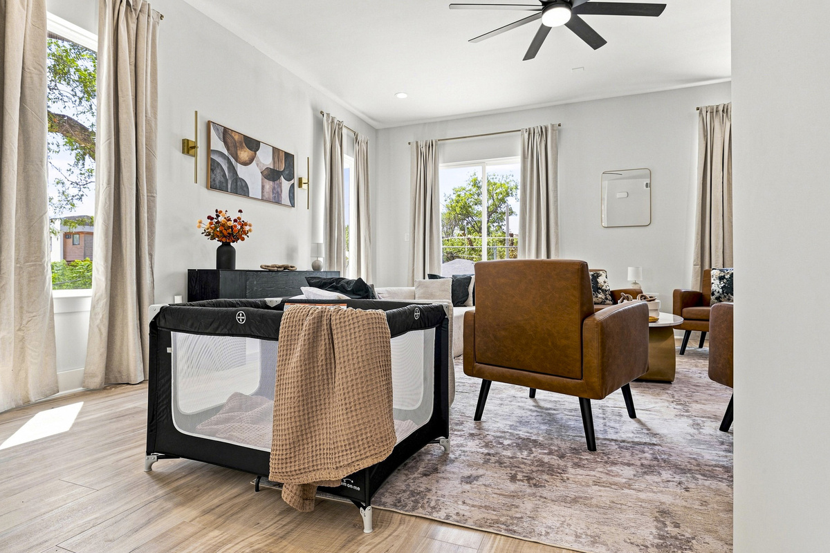 Bright and airy space featuring stylish decor and inviting seating for relaxation!
