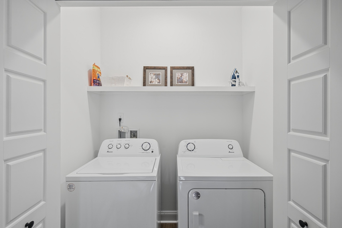 Full-size washer and dryer and an iron provided