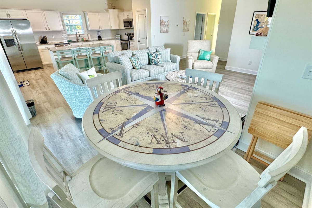 Enjoy a meal with a water view at the compass-themed table or at the kitchen bar seating.