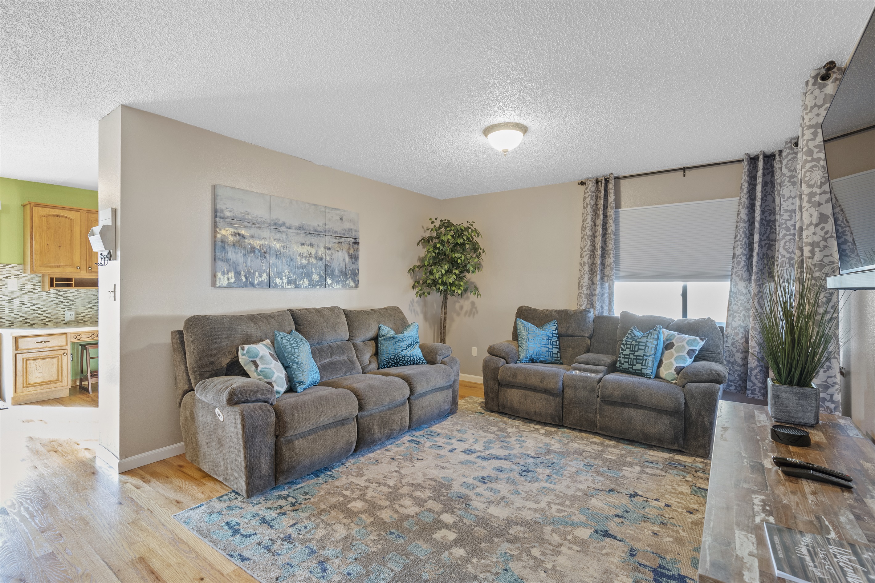 Enjoy an evening watching movies in our main level living room.